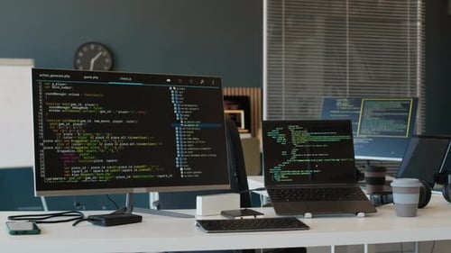Computers With Codes On Screen In Office