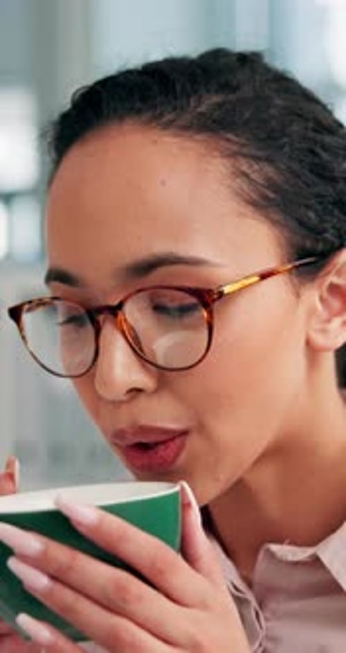 Corporate, woman and relax with coffee in office on break for calm, peace and morning beverage