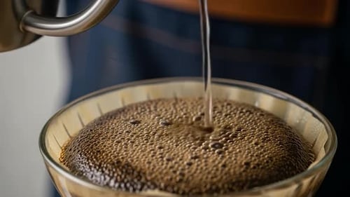 Pouring Water Over Fresh Coffee Grounds Brew