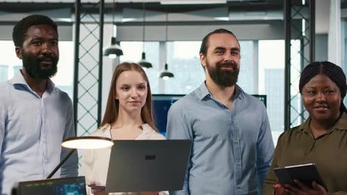 Portrait of Smiling Teamworking Programmers Utilizing AI to Optimize Performance