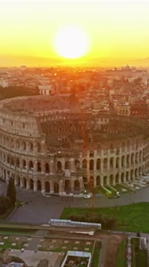 Aerial View of Iconic Ancient Arena of Colosseum at Sunset Flavian Amphitheatre in the Heart of Rome