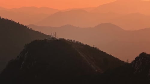 Majestic Mountain Range View During Golden Hour Sunset