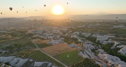 Aerial Cinematic Drone View of Colorful Hot Air Balloon Flying Over Cappadocia