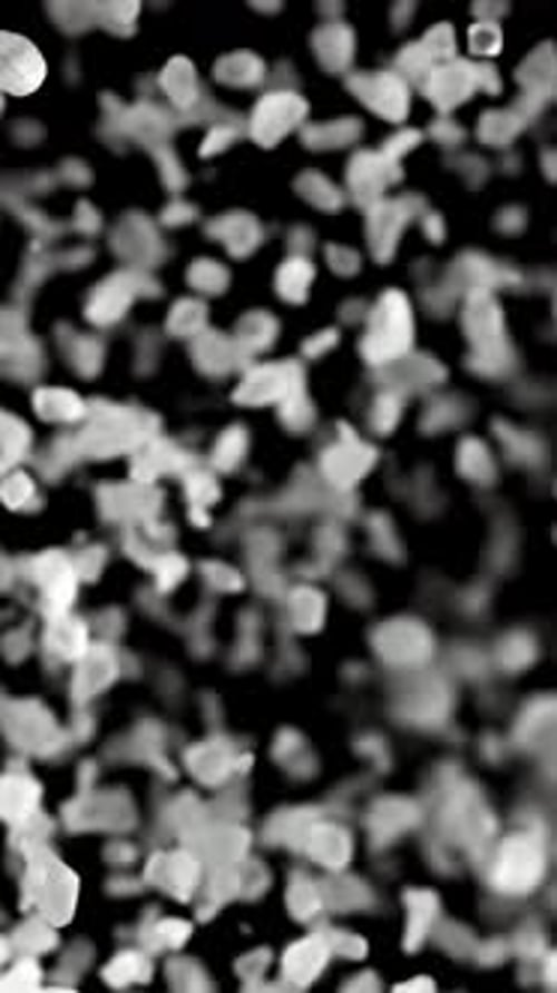 Salt Flies Up and Falls Down View From Above Filmed on a Highspeed Camera at 1000 Fps