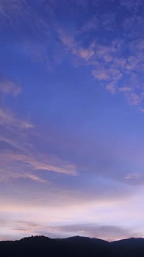 Colorful Sky at Sunset Over Mountain Range