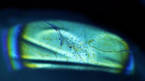 4k stable shots of soap balloons showing the colors of the macro world through a microscope perspect