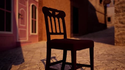 A Wooden Chair Sitting on a Cobblestone Street
