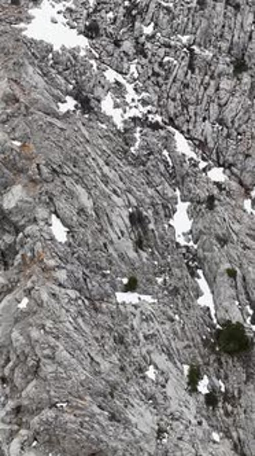 Vertical Video Winter Forest Cinematics Aerial View of Mountains River and Captivating Waterfalls