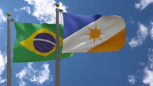 Waving Flags of Brazil and Tocantins State Against Blue Sky