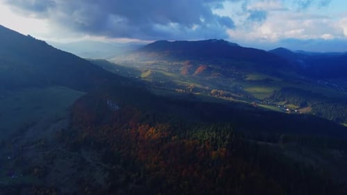 Bird's Eye View of Autumn Rural Landscapeforest Hilly Landscape Sunlight Illuminating the Hills