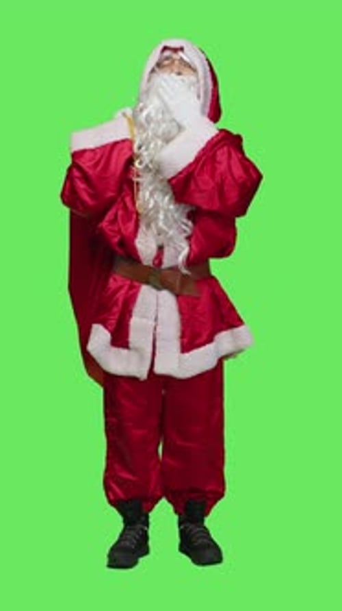 Vertical Video Front View of Sleepy Person in Santa Suit Yawning