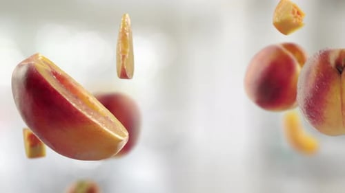 Fresh Peaches Floating in Air
