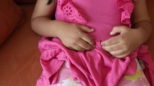 Child Suffering Stomach Pain Close Up