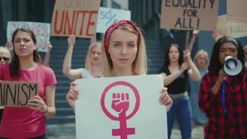Young Adults Protesting for Equality and Feminism