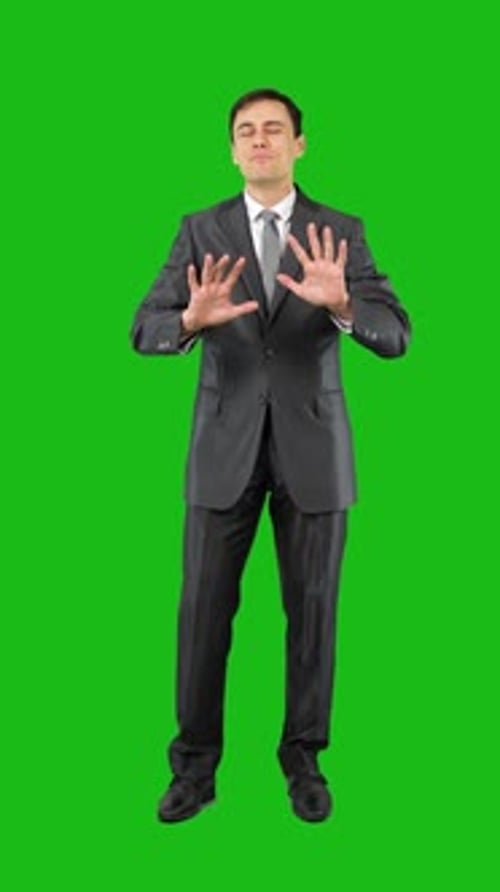 Businessman Showing Like Gesture in Studio Chroma Key