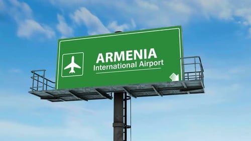 Panneau d'affichage vert vif de l'aéroport international d'Arménie sous la lumière du jour