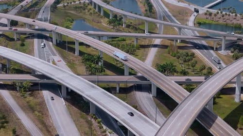 Highway Interchange in Miami City with the Fastmoving Vehicles Showing US Transportation