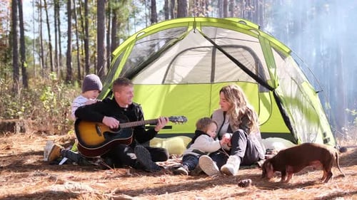 A Family Enjoys a Camping Adventure in the Picturesque Woods Laugh and Play Music