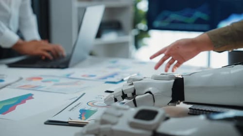 AI and Human Team Analyze Data in Office