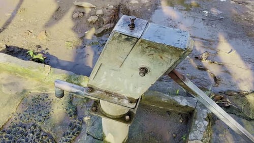 Old Hand Pump in Rural Area – Camera Spinning Around