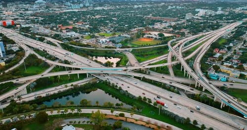 Road interchange of highways and freeways in colorful Miami.