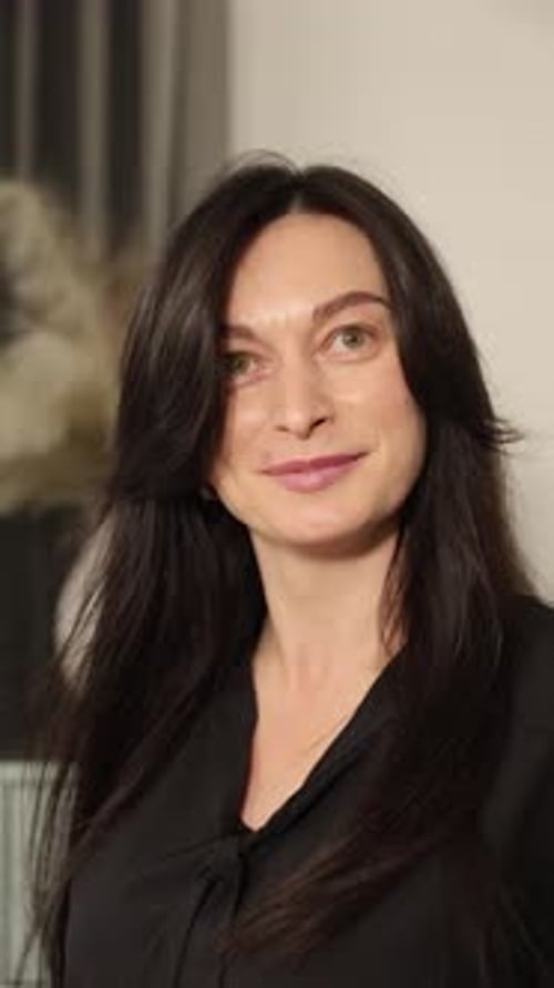 Confident Woman Smiling Warmly in Stylish Lifestyle Portrait Vertical Video