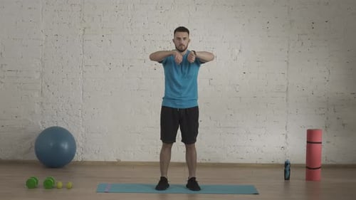 Man Fitness Instructor in Sportswear Doing an Elbows Warm Up for Online Class at the Home Studio HDR