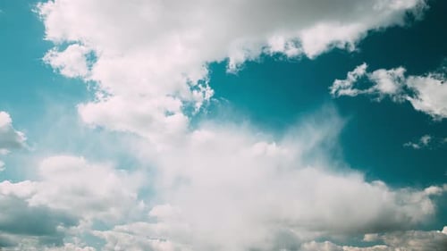 Cloudy Sky With Fluffy Clouds