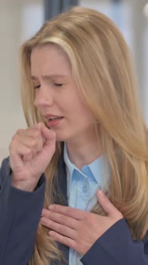 Portrait of Sick Young Businesswoman Coughing, Vertical Video