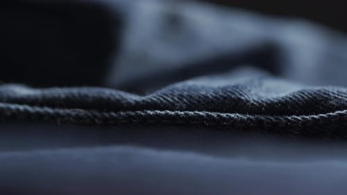 Detailed Close Up of Dark Blue Denim Fabric