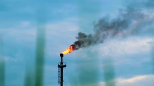 Refinery plant burning combustion of associated gas flare stack tower oil rig