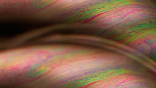 Abstract Multicolored Patterns Flowing and Swirling with Light