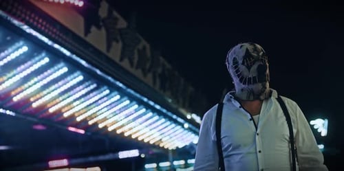 Masked Figure in Night Urban Scene