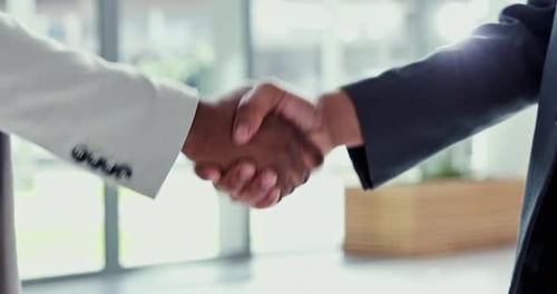 Business people, handshake and meeting in partnership, thank you or deal together at the office