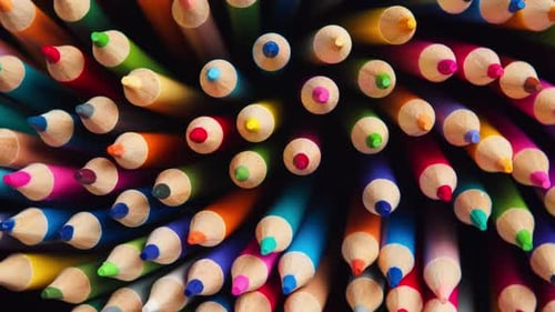 Top View of Sharpened Multicolored Drawing Pencils Rotating in a Circle