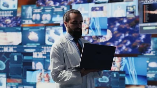 Doctor Uses Laptop in Futuristic Medical Lab
