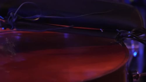 Close Up of Cello Playing in Concert