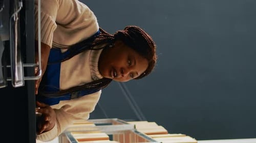 Vertical Video Warehouse Colleagues Checking Supplies Stock in Depot