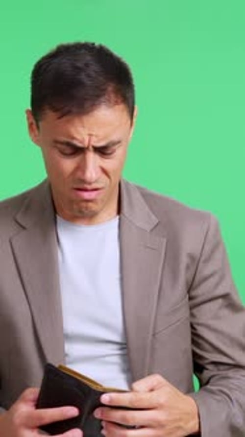 Disappointed Broke Man Showing His Empty Wallet