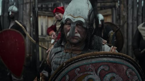 Portrait of Mature Military Chief with Sword and Shield Guarding Feudal Fortress