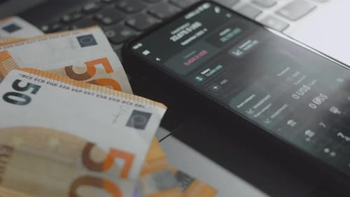 Smart Money Management Using Technology to Track Budget A Person Who Uses a Cell Phone to Do Their