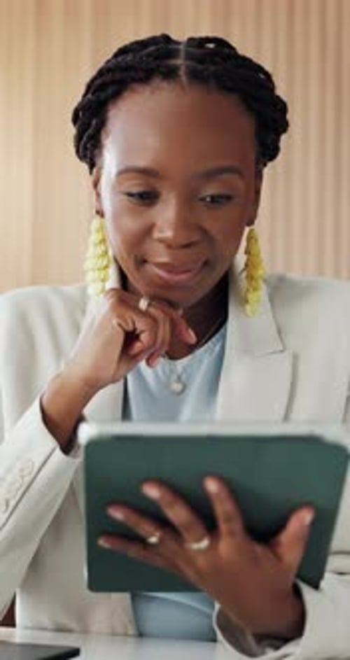 Business, black woman and reading with tablet in office for research, email client and real estate