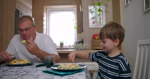 Family Enjoying a Meal Together at Home
