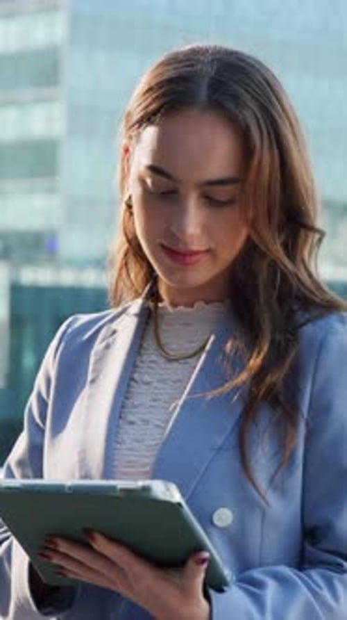 City, development and tablet with designer woman on rooftop for planning, review or scrolling