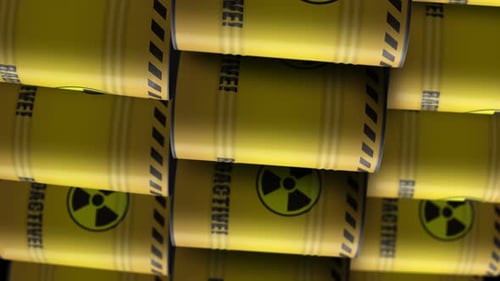 Nuclear radioactive waste barrels in row endless vertical