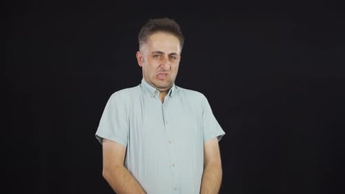 The man is disgusted.