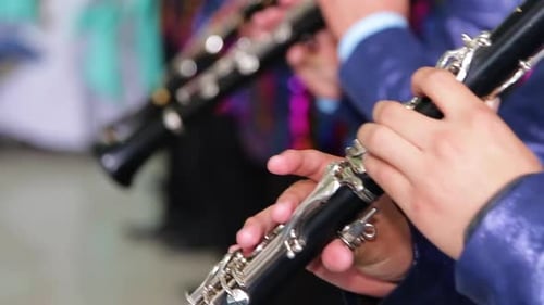 close up to musician playing the clarinet