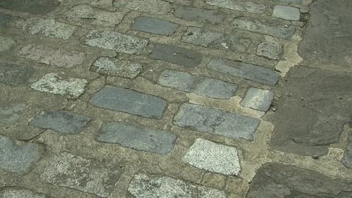 Close Up of Gray Cobblestone Pavement