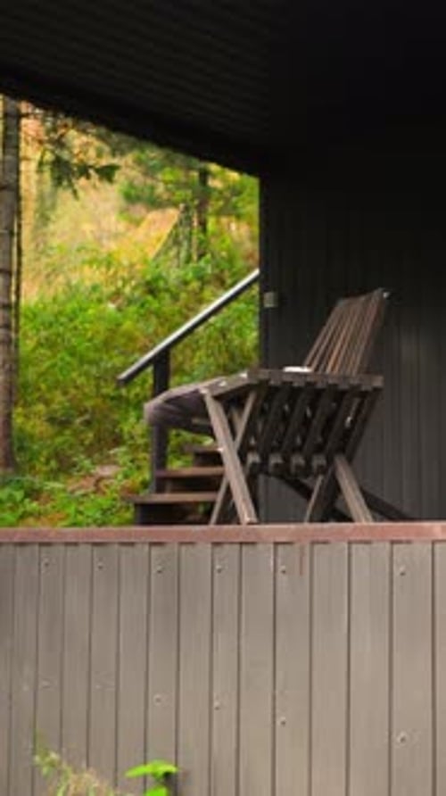 Chairs Sit on Peaceful, Autumnal Porch