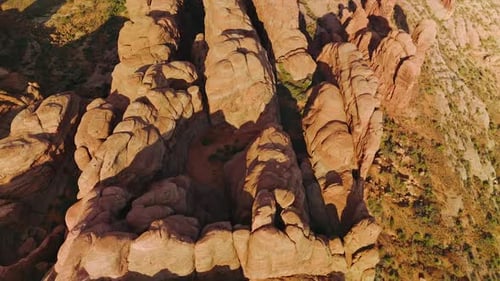 Group of rock formations with rounded tops from aerial erosion.